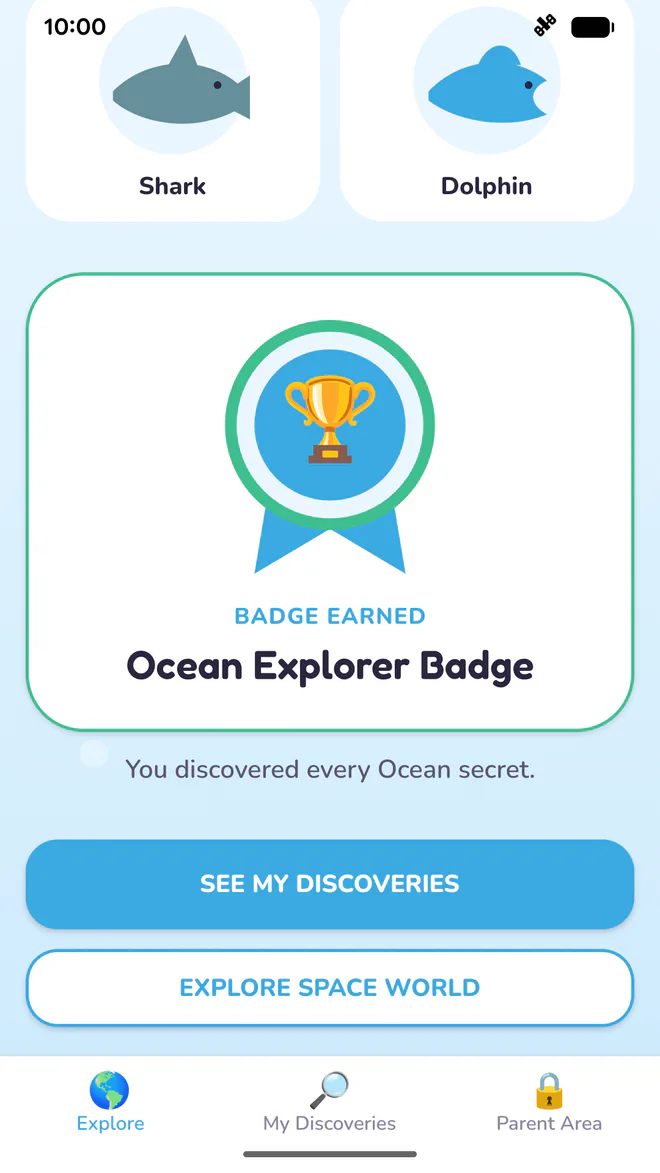 Celebration screen showing the earned Ocean Explorer Badge.
