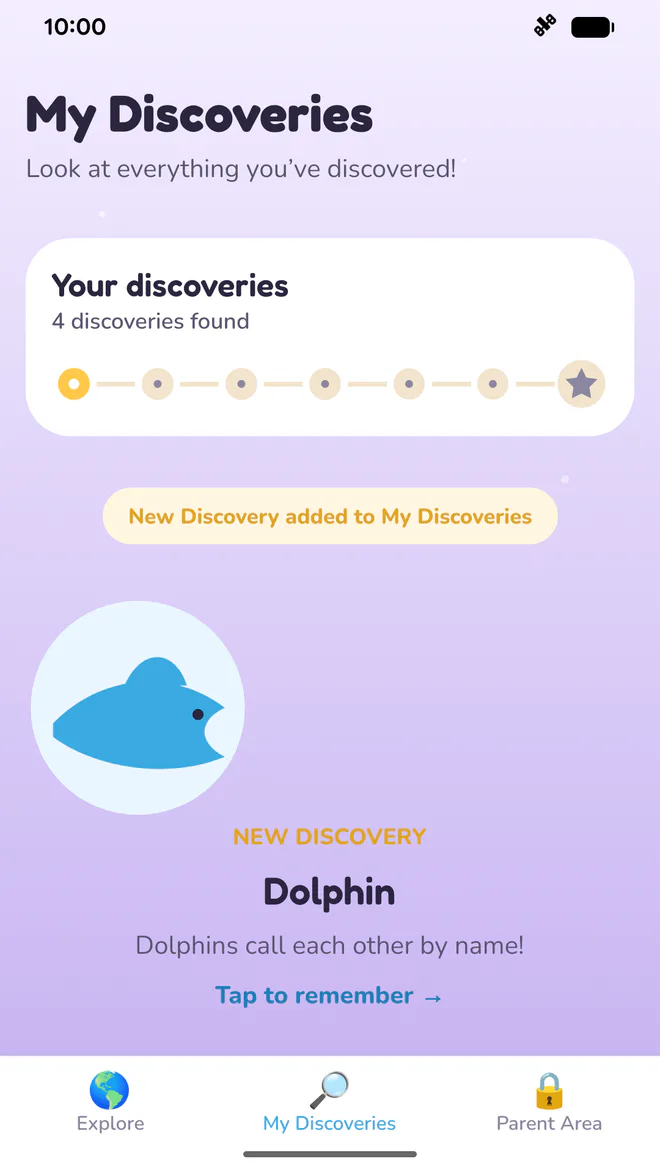 My Discoveries screen showing learning progress and a saved dolphin discovery.